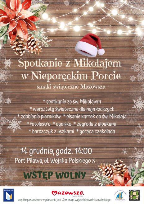 Na drewnianych deskach opruszonych śniegiem widać harmonogram napisany na biało jak śnieg, z widoczną nad tekstem czapką świętego Mikołaja