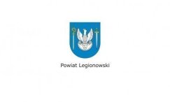 Herb Powiatu Legionowskiego biały orzeł na błekitnej tarczy